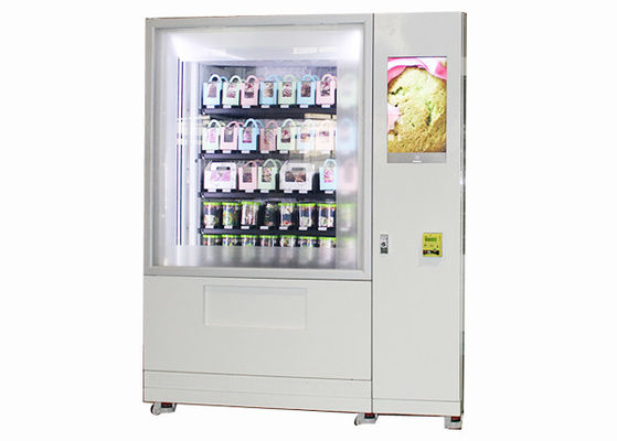 Insalata all'aperto del frigorifero in un distributore automatico del barattolo con il touch screen a 32 pollici